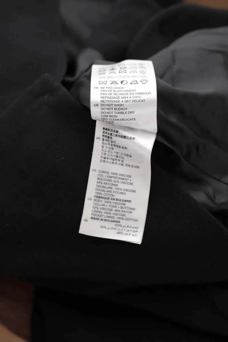 Blazer Sandro noir. Matière principale viscose. Taille 36.